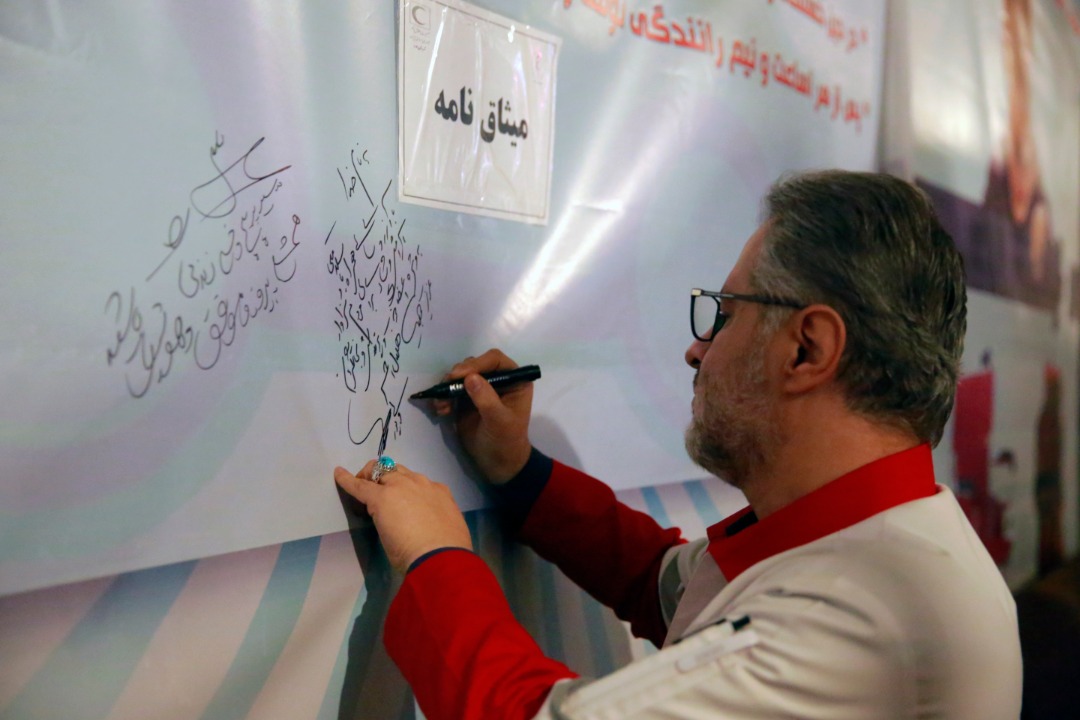 مراسم تحویل سال 1401 در کنار امدادگران پایگاه امدادی ملارد/ گزارش تصویری